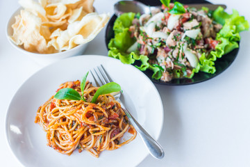 Spaghetti with tomato sauce.