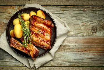 Keuken foto achterwand Grill / Barbecue grilled pork ribs and potatoes