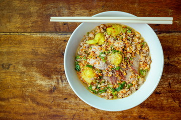 Noodles pork dumplings,spicy soup thai style