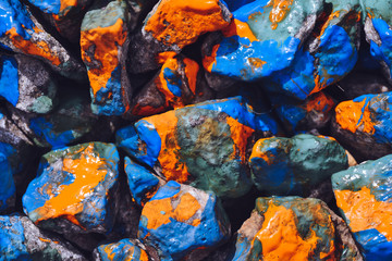 pebbles painted in different colors