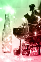 gradient green red color with wine glass and Christmas decoratio