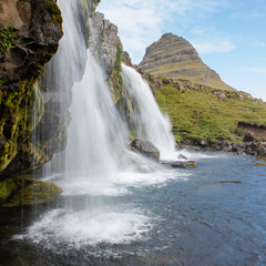 Kirkjufellsfoss waterfall near the Kirkjufell mountain