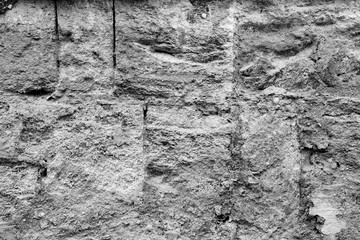 Wall fragment with scratches and cracks