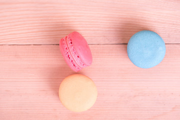 macarons sweet beauty dessert on wood background pink color tone.