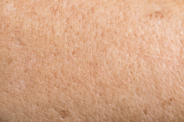 Naklejka premium closeup elder human wrinkled skin, white asian women.