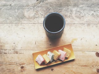 Tea and Mochi on a wood table