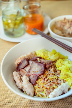 Noodles pork dumplings,spicy soup thai style