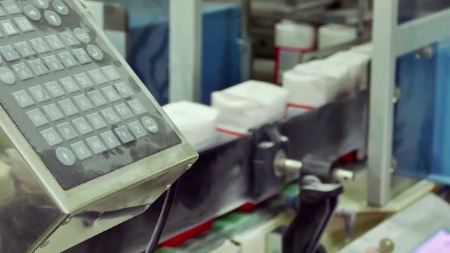 Packing sugar on a conveyor belt in a factory for processing sugar beet, 4 K Video Clip