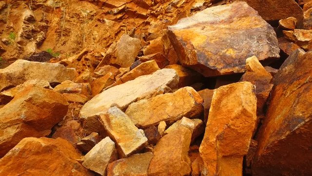 Sharp rocks of big debris in the forest.