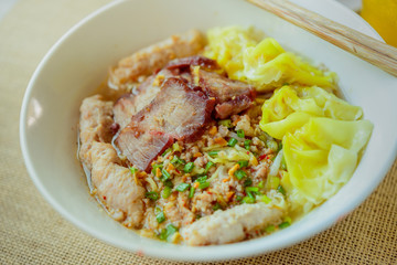 Noodles pork dumplings,spicy soup thai style