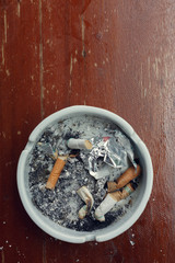 cigarette stub in ashtray, image no smoking concept background