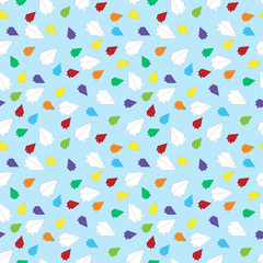 Cute funny seamless background pattern with multicolored planes on the blue background. Vector illustration