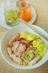 Noodles pork dumplings,spicy soup thai style