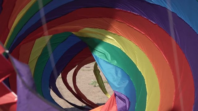 Floating multi-colored parachute