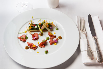 High French cuisine. Slices of roast beef with sauce and millefe