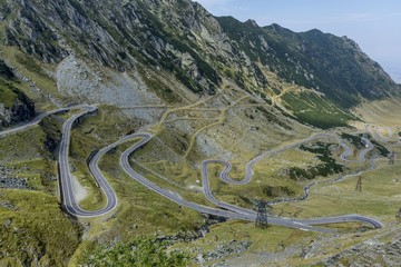 Transfagarasan - High altitude winding road in Carpathians mountains panorama. Aerial view.