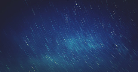 Silhouettes of the starry skies and star-trails.