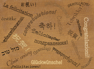 Gold card with 'Congratulations!' in23 languages