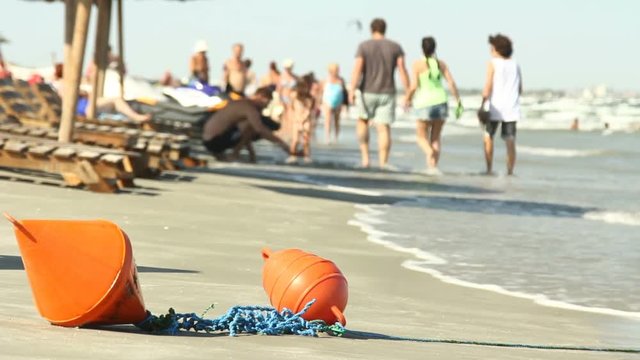 People enjoy, swimming, walking, play with children. Sunbathing and relax under parasol on the beach of the blue sea 26