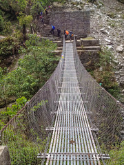  Metal foot bridge cross river, Annapurna Base Camp, Nepal