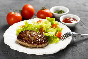 Beef burger with tomato sauce