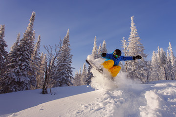 Snowboarder jumping