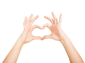 Woman's hands show heart shape isolated on white backgrounds