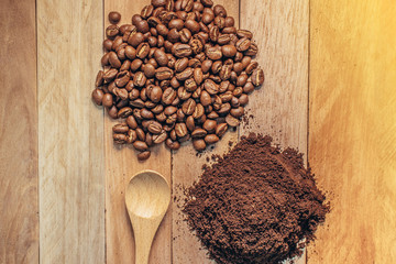 Coffee Residue and Coffee been,Spoon on wooden background
