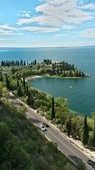 Fototapeta na wymiar Traumhafter Blick auf die Punta San Vigilio, Gardasse - Italien