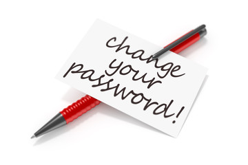 business card a ball pen and the text change your password