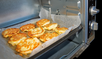 image of cheesecakes in the oven closeup