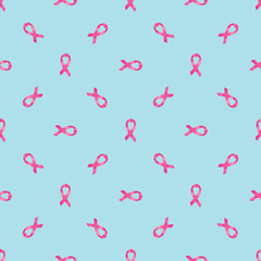 Pattern with pink ribbons against breast cancer on a blue background