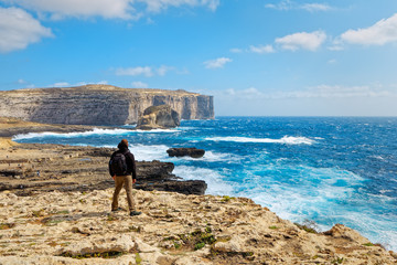 On the cliff of Dwejra Bay in Gozo, Malta