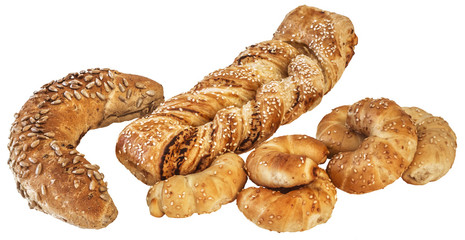 Integral Roll Sprinkled With Sunflower Seeds With Braided Croissant And Bunch Of Cheese Sesame Rolls Isolated On White Background