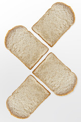 Close-up brown bread slice isolated on white background