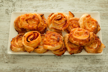Savory puff pastries spiral shaped