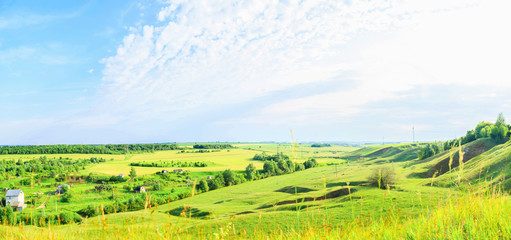 Obraz premium countryside in Russia, fields and cottage. Panorama.