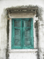 vintage window in an old building of Bangkok, thailand