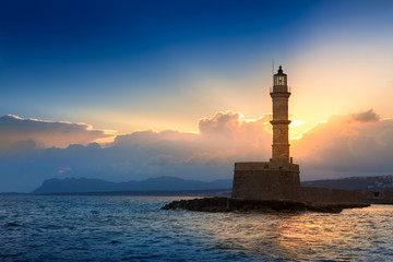 Obraz premium Lighthouse on sunset. Chania, Crete, Greece.