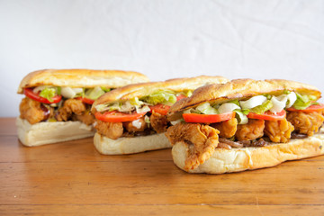 Three submarine hoagie sandwiches