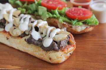 Closeup of sandwich with mayonnaise and mushroom