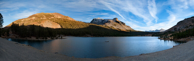 Clear lake with reflection when entering Yosemite NP through the Tioga Pass, USA