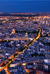 Illuminated street in Paris by night