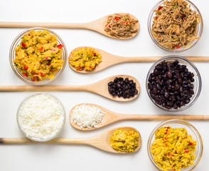 Venezuelan typical food, arepas and their different combinations. Chicken, fish, meat, cheese, black beans and pork.