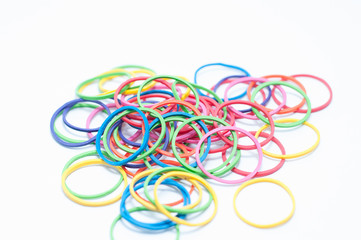 Many colorful rubber bands of background