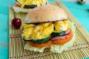 Vegetarian Diet burgers with sweet omelette and vegetables.