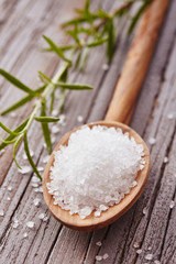 Salt crystals in a wooden spoon
