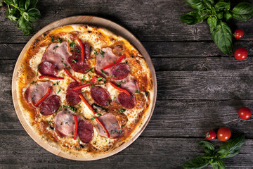Pepperoni Pizza with salami, bacon , red pepper and green onions