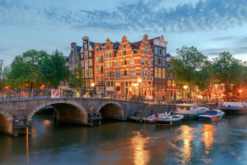 Amsterdam. Night view of the houses along the canal.
