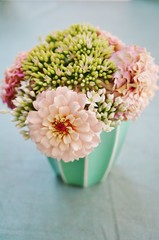 Small autumn flower bouquet with zinnias and sedum flowers